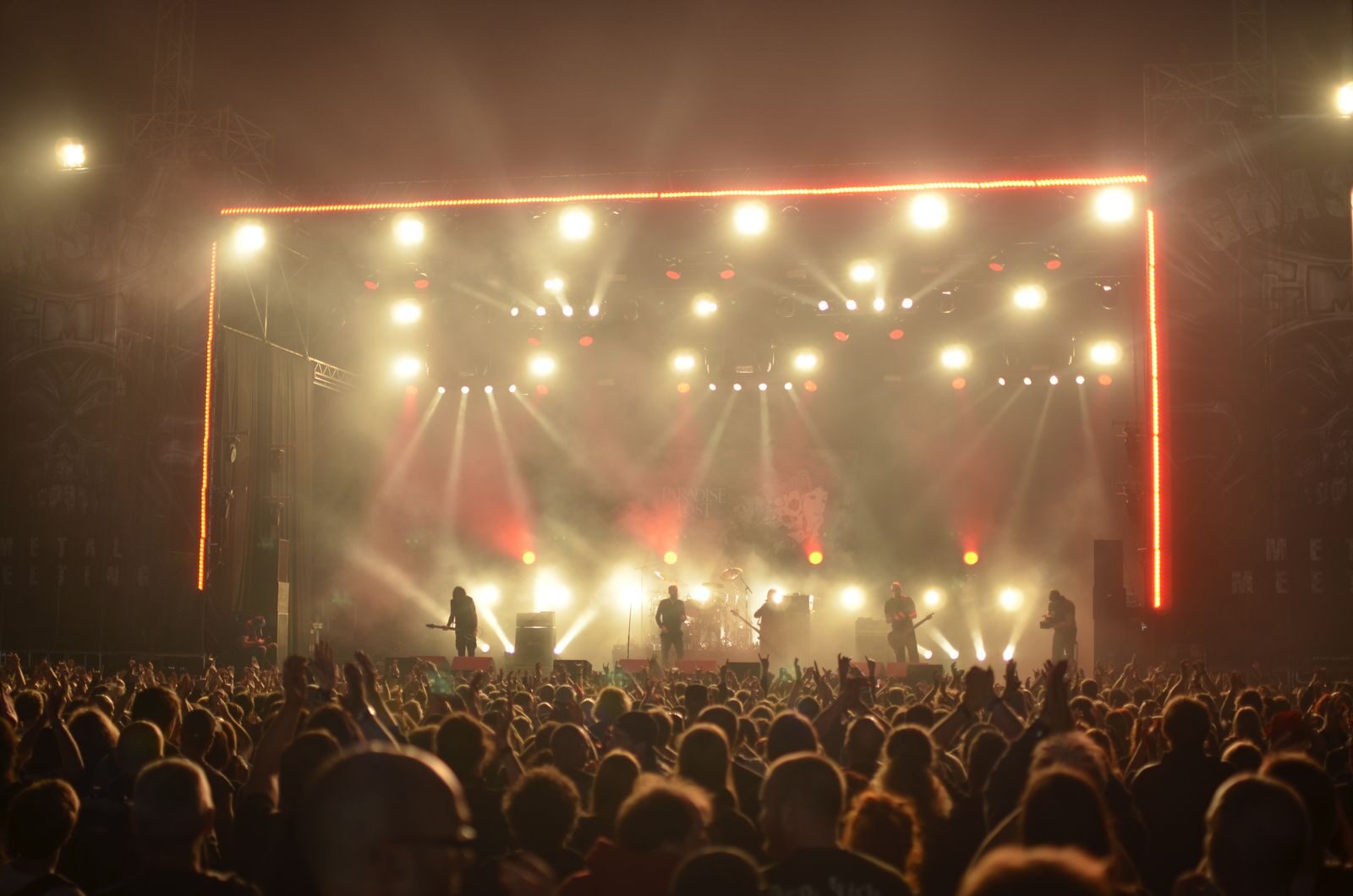 A church stage illuminated with colorful concert lighting